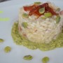 Risotto con fave e speck su crema di fave