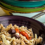 Fusilli di riso con pomodorini e paté di olive